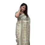 Elegant Cream and Green Cotton Saree with Floral Motifs